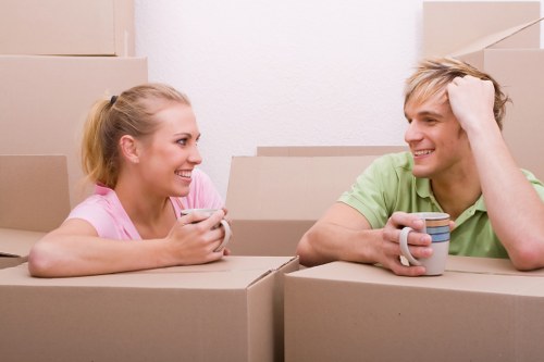 Moving van and packed boxes for a home move in Willesden