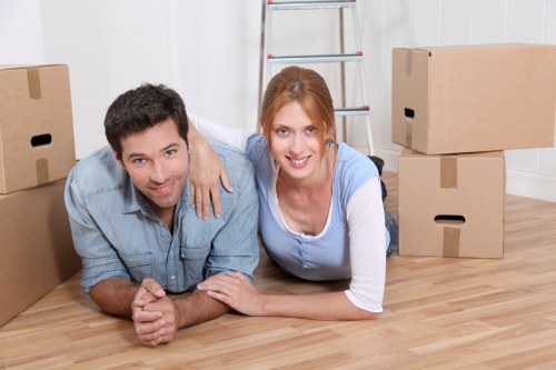 Careful furniture handling during a house move in northwest London