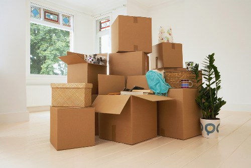 Packed boxes and furniture ready for a local house move in Willesden